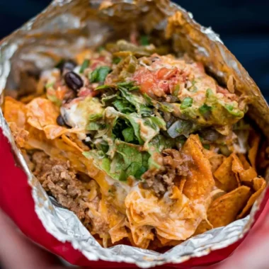 Delicious Camping Tacos prepared over a campfire in nature.