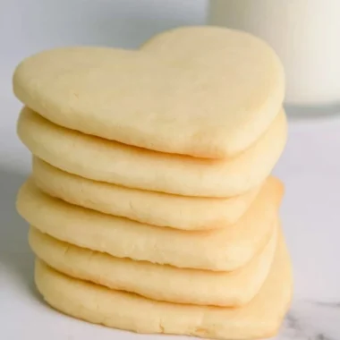 Cozy cut out sugar cookies decorated with colorful icing and sprinkles