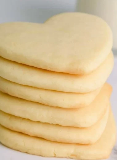 Cozy cut out sugar cookies decorated with colorful icing and sprinkles
