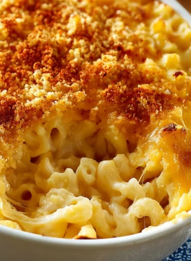 Creamy baked macaroni and cheese dish topped with breadcrumbs and melted cheese