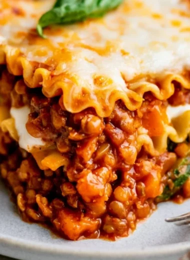 Delicious easy vegan lentil lasagna layered with vegetables and rich tomato sauce