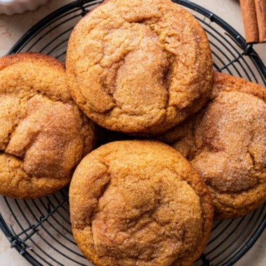 Delicious Pumpkin Snickerdoodles cookies sprinkled with cinnamon sugar
