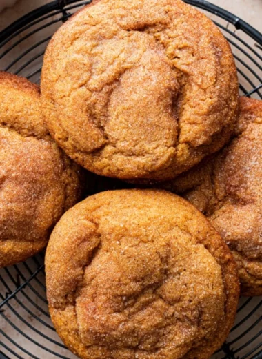 Delicious Pumpkin Snickerdoodles cookies sprinkled with cinnamon sugar