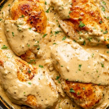 Boursin Chicken dish with creamy sauce and herbs on a plate
