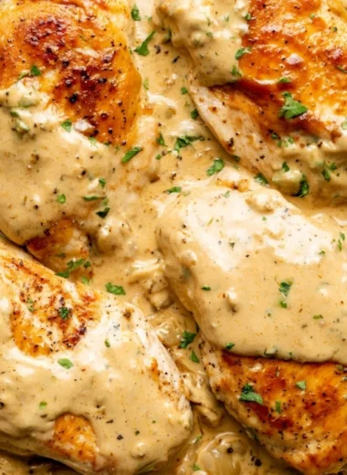 Boursin Chicken dish with creamy sauce and herbs on a plate