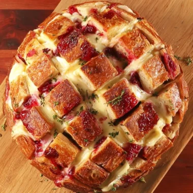 Cranberry Brie Pull-Apart Bread with golden crust and melted cheese