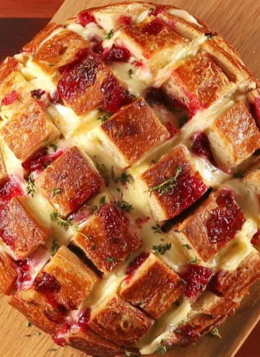 Cranberry Brie Pull-Apart Bread with golden crust and melted cheese