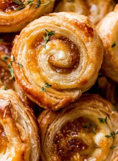 Fig and Goat Cheese Pinwheels appetizer with fresh herbs and spices