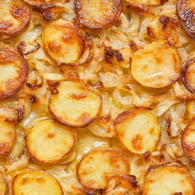 Baked potatoes with onions from a beloved 1952 family recipe.