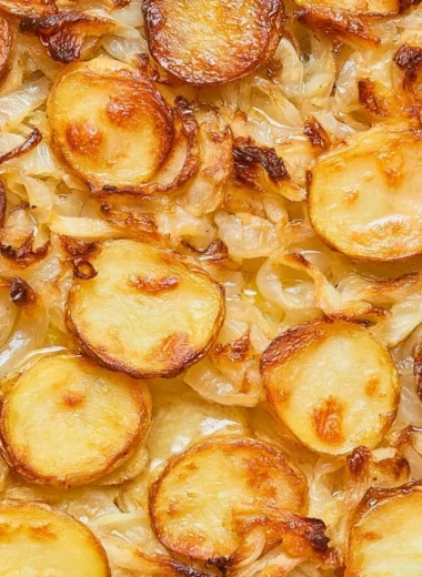 Baked potatoes with onions from a beloved 1952 family recipe.