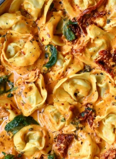 Creamy Marry Me Tortellini with rich sauce and herbs in a bowl